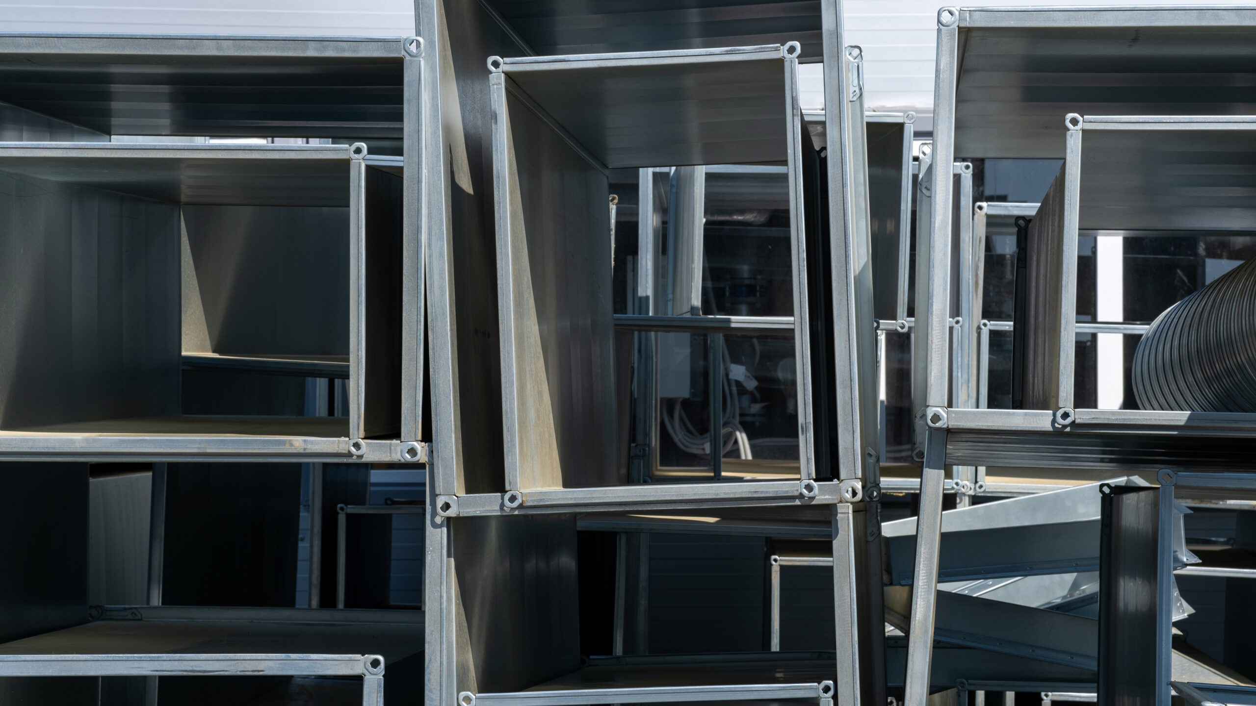 Prefabricated sheet metal duct modules assembled offsite for modular delivery in Ontario mechanical systems.
